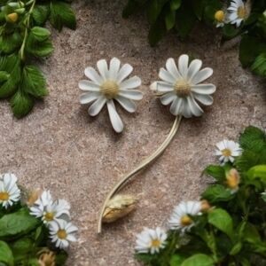 ANTHROPOLOGIE ASYMMETRIC DAISY EARRINGS